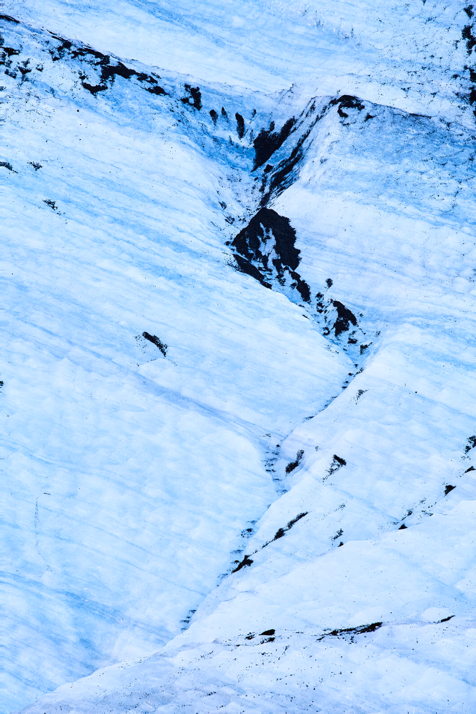a person riding a horse on a snowy mountain
