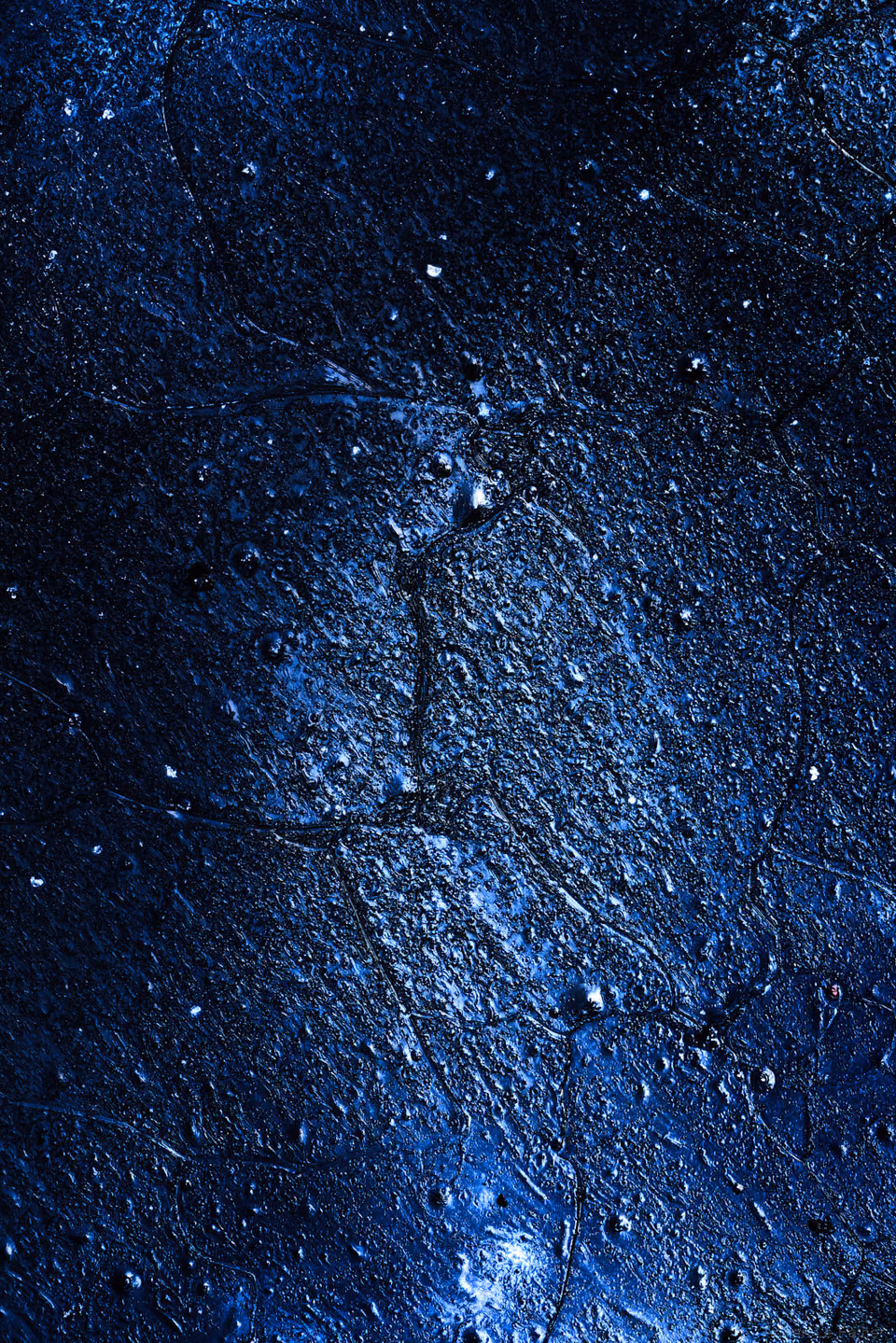 a blue and black background with stars
