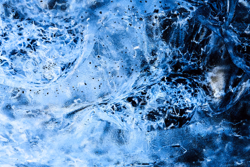 a close up of a blue ice sculpture
