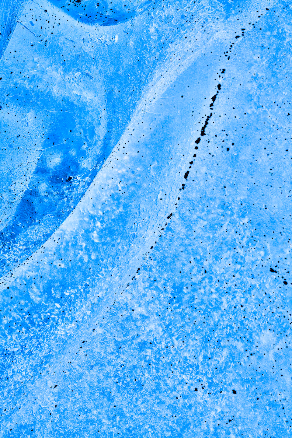 a close up of a blue water surface
