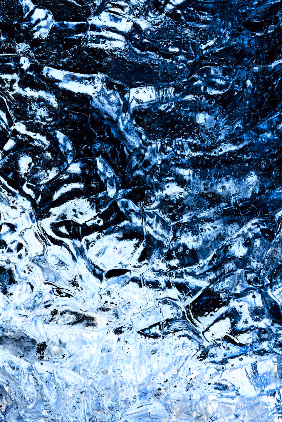 a close up of water with ice on it
