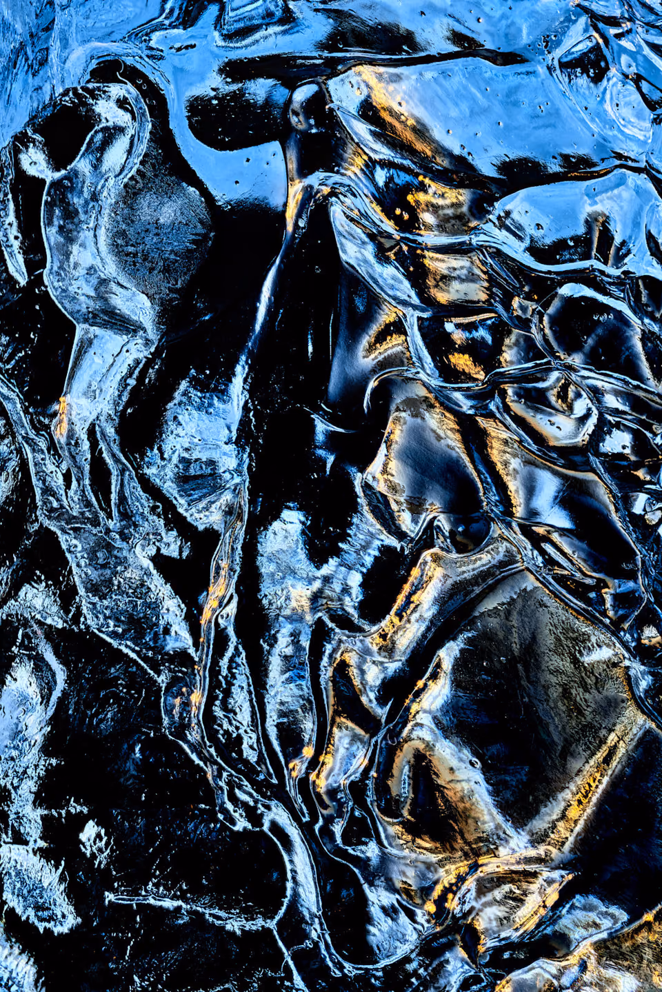 a close up of ice on a river
