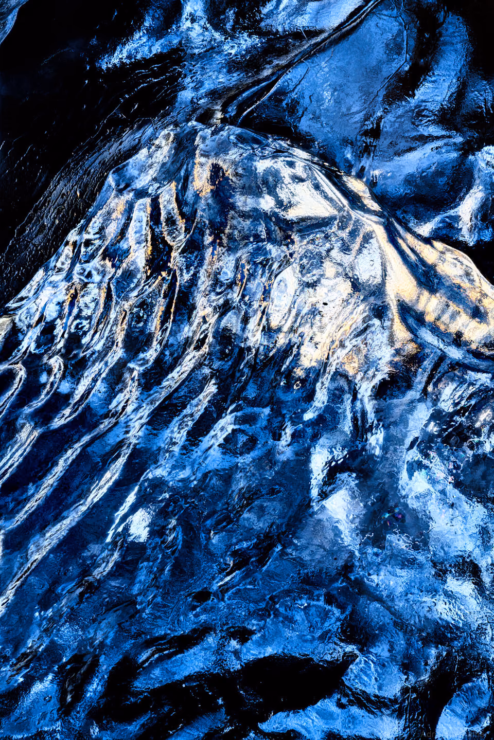 a close up of a blue and white ice sculpture
