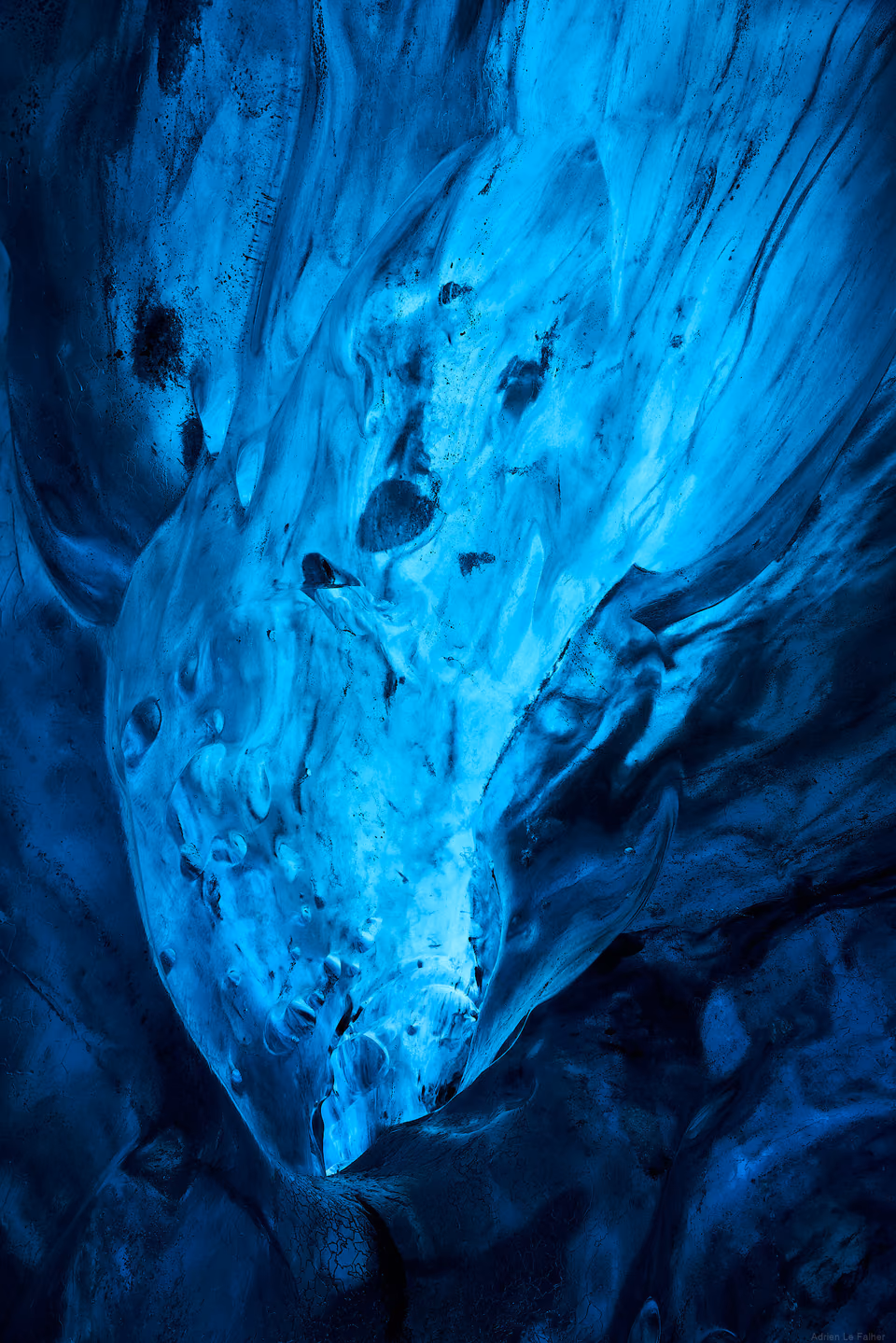 a close up of a blue ice cave
