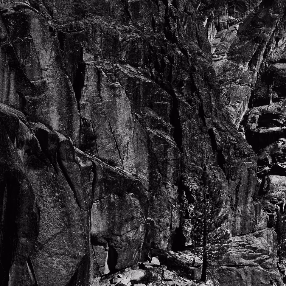 black and white photograph of a rock formation
