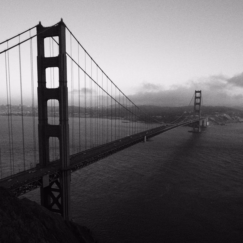 a black and white photo of the golden gate bridge
