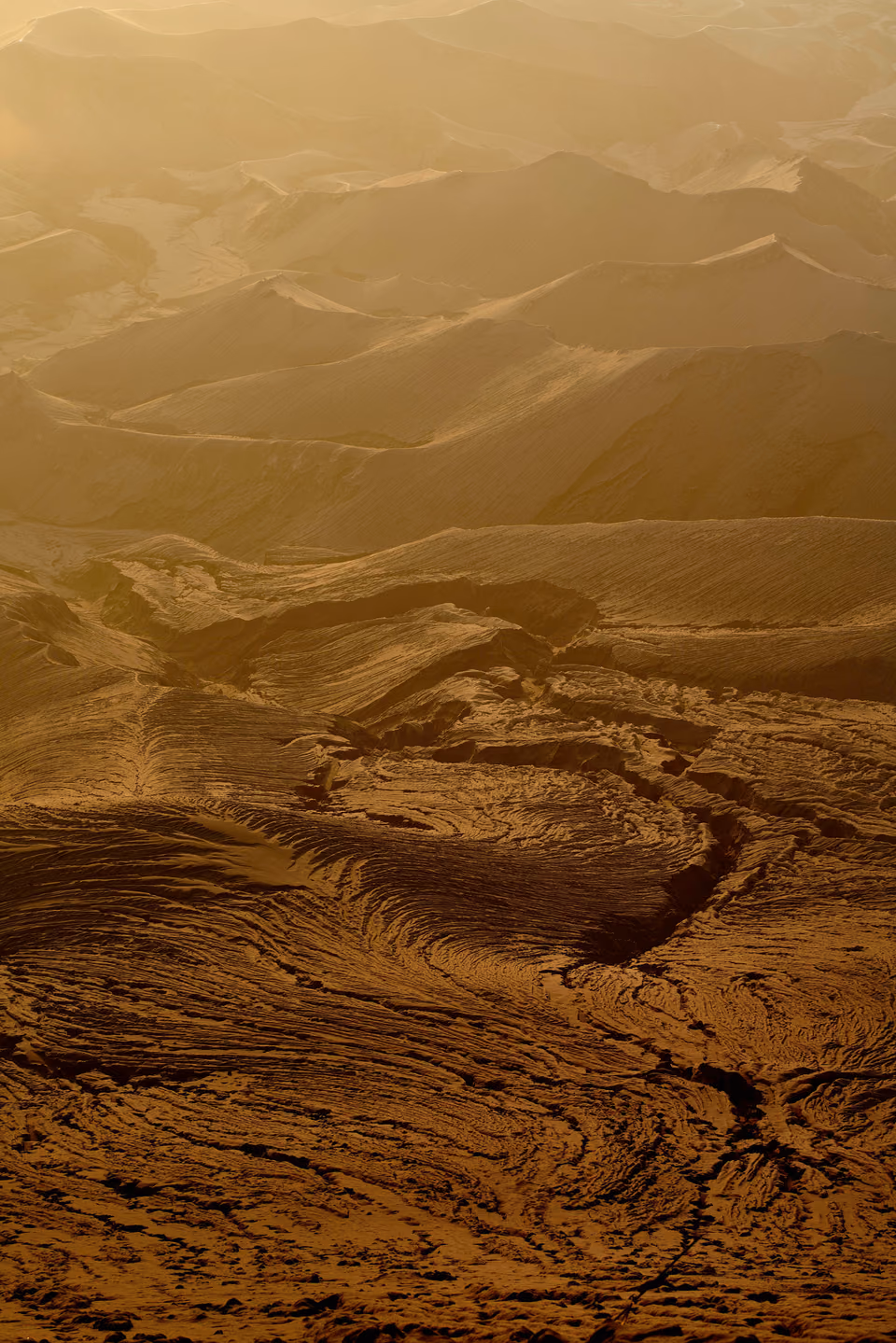 a person riding a horse through the mountains
