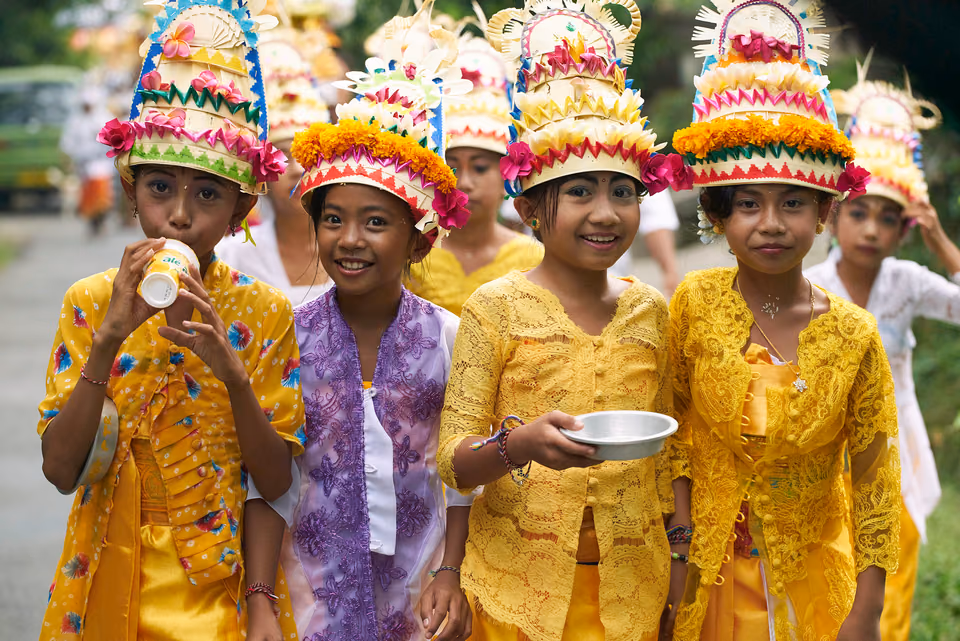 a group of children dressed in colorful costumes

