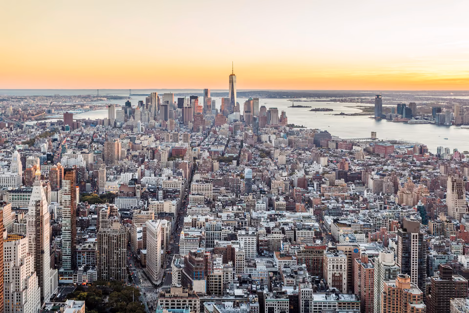 a view of the city from the top of a building
