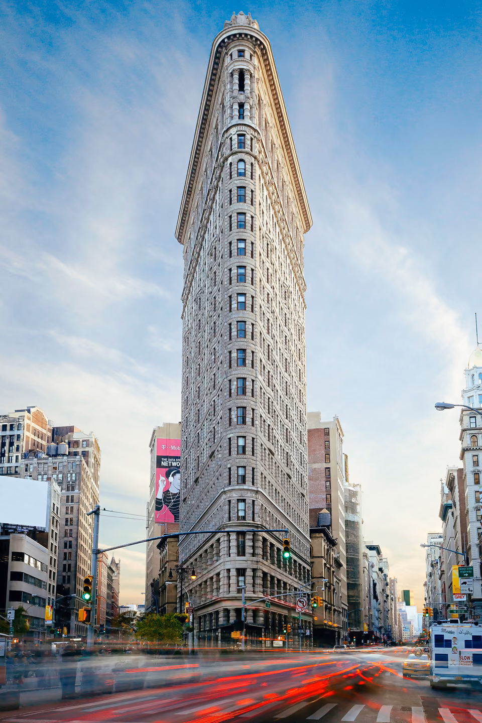 a tall building with a clock on it
