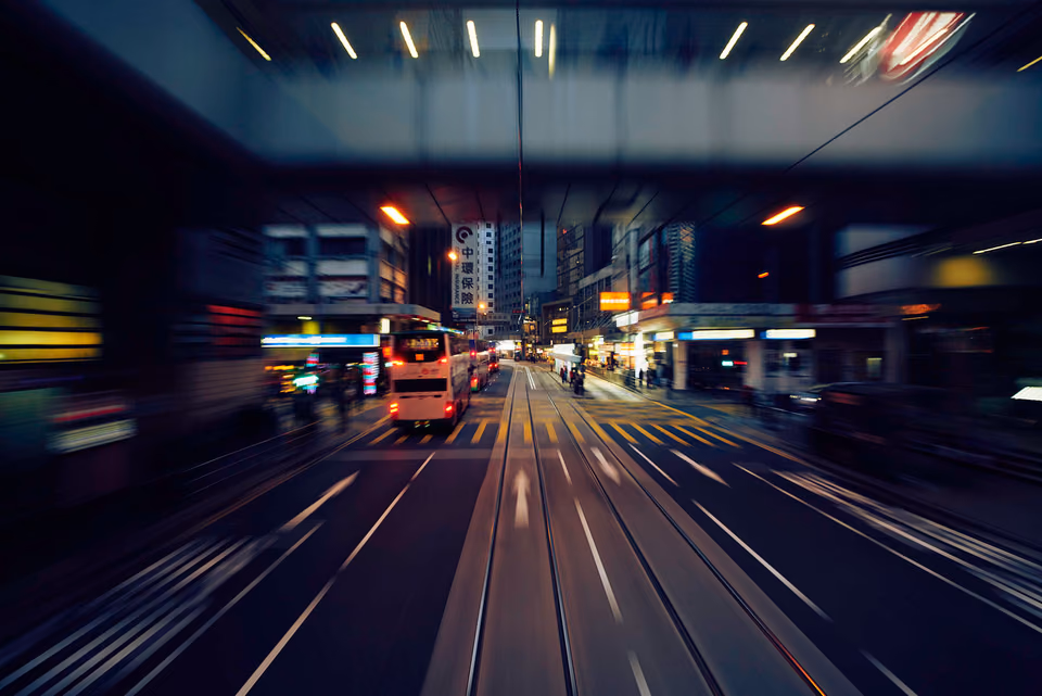 a blurry picture of a city street at night
