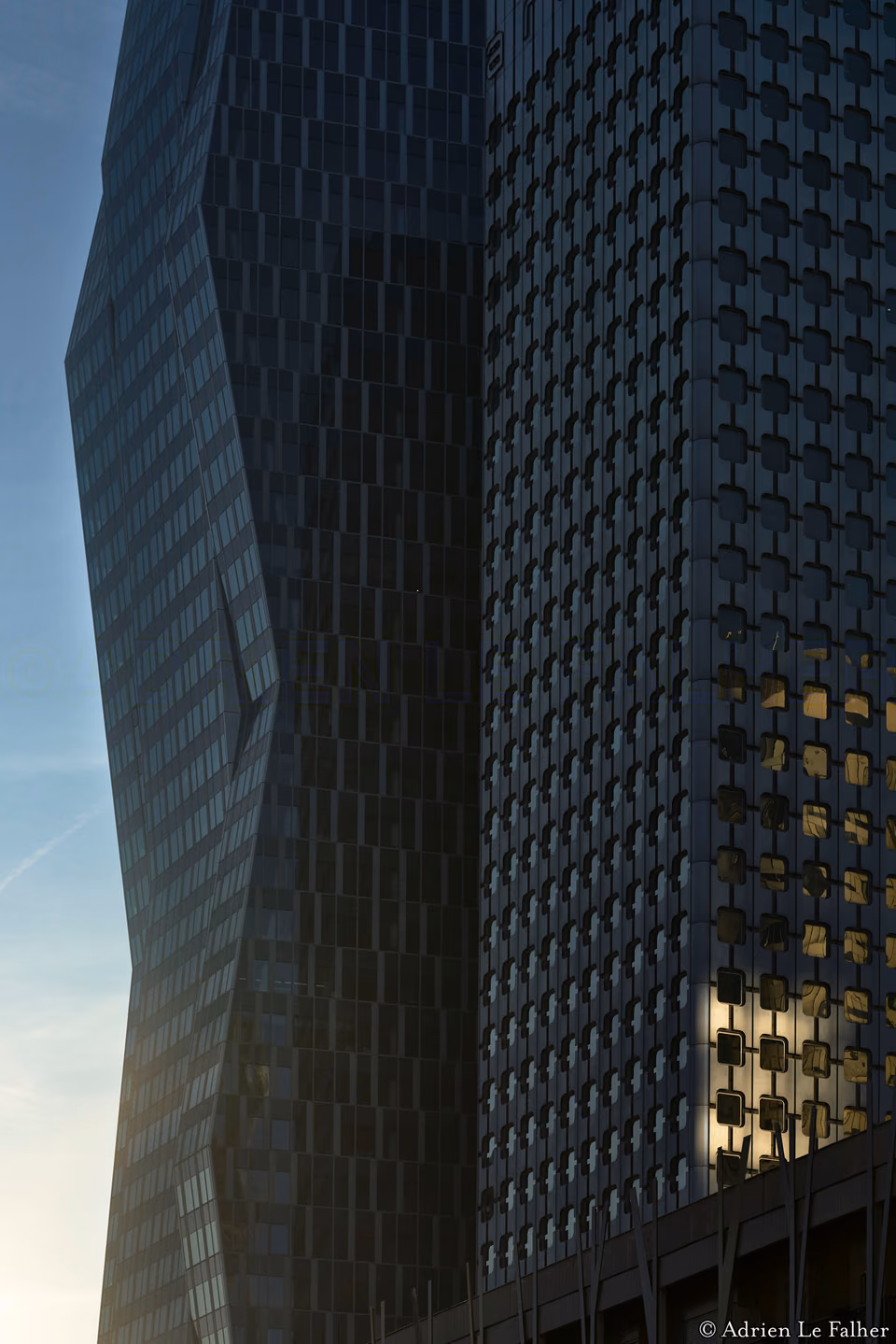 a building with a large window and a sun

