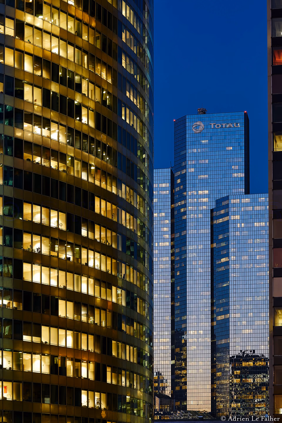a city skyline with many tall buildings

