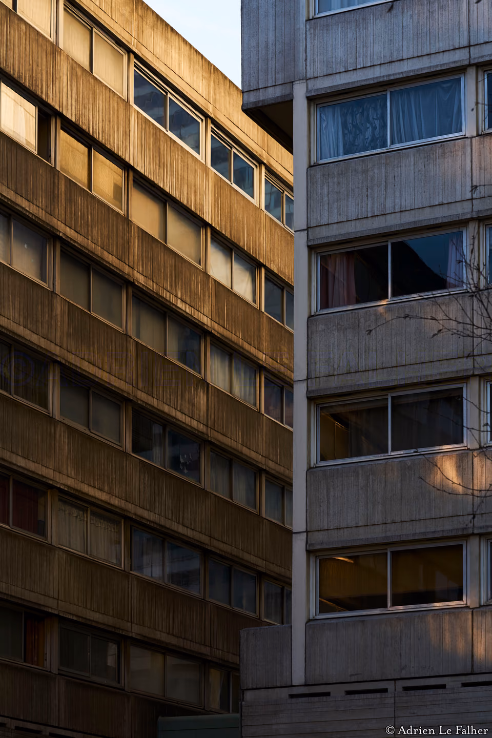 a building with windows and a clock on it
